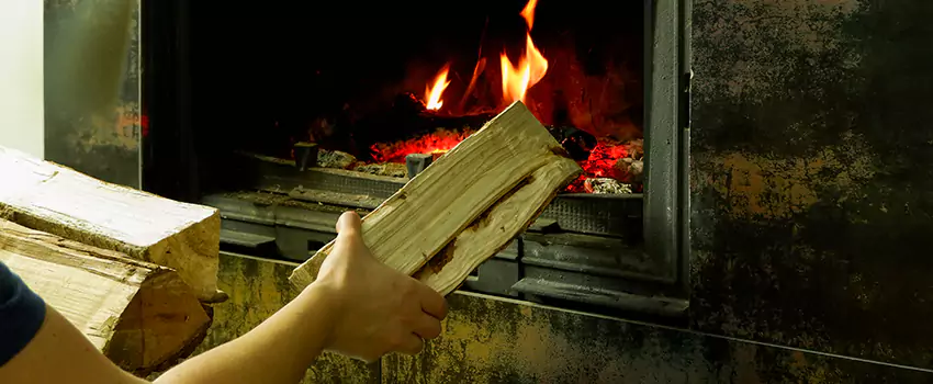 Wood Stove Heat Resistant Wall Repair in Dover Bay, British Columbia